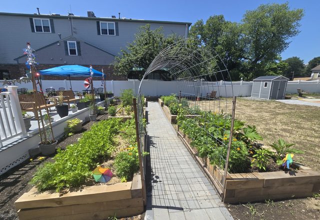 The center's outdoor raised-bed vegetable garden