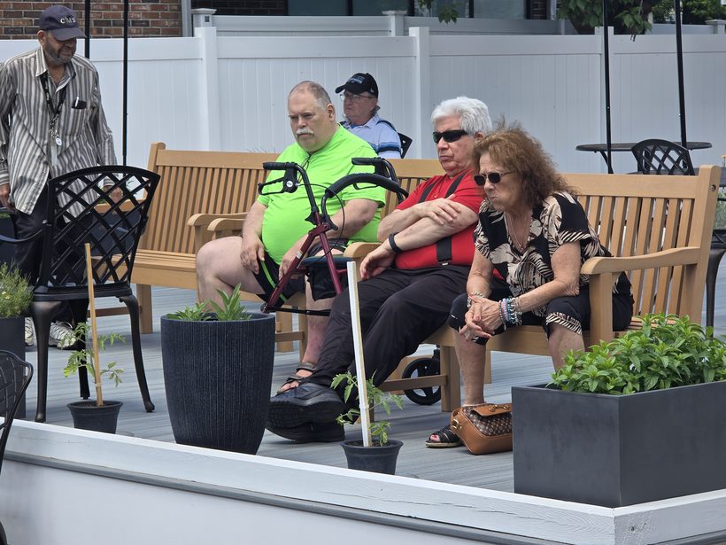 Members relaxing among the planters