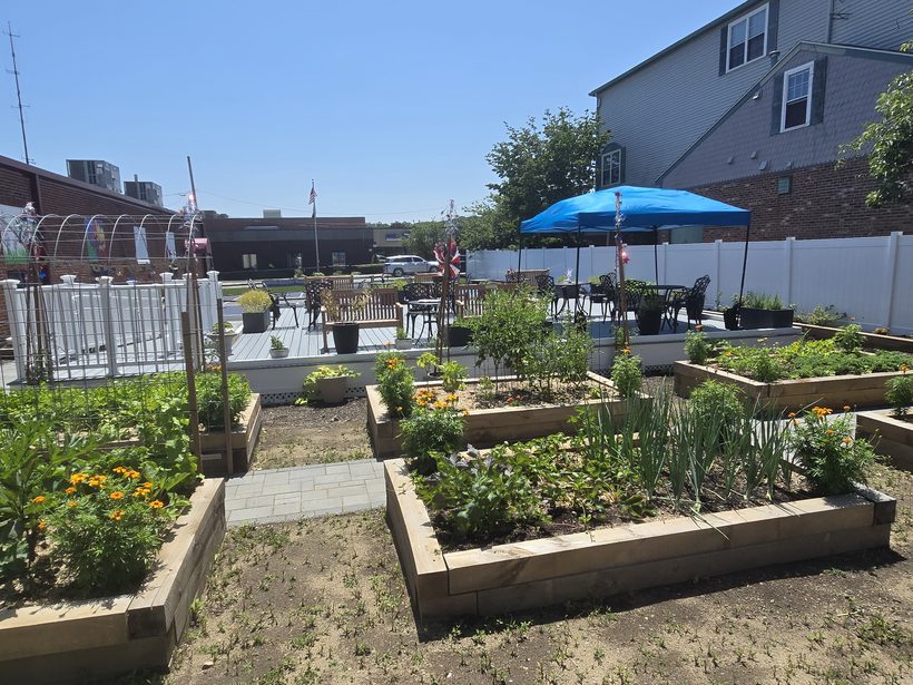 The garden and green space behind the center